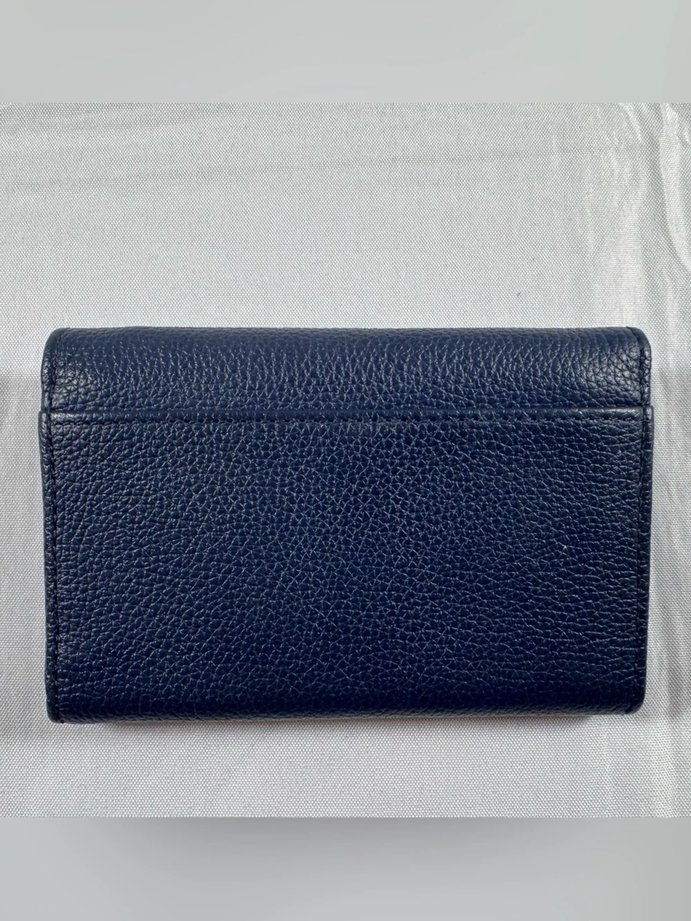Dooney & Bourke Navy Pebble Leather Wallet with Metal Logo Plaque